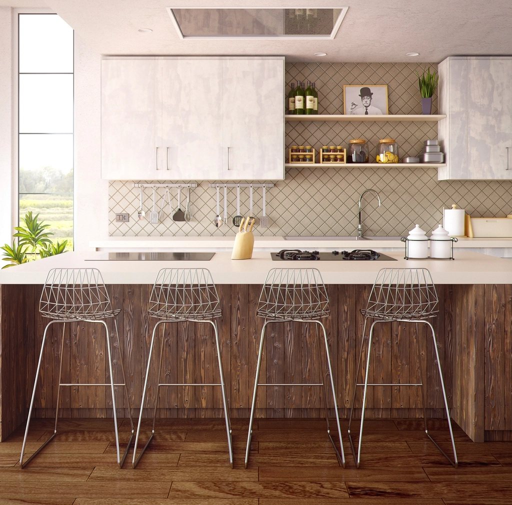 Warm modern kitchen with custom cabinetry and stone island